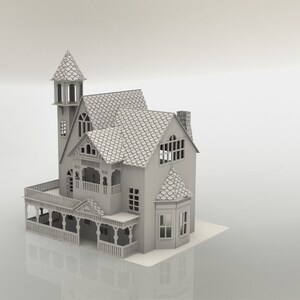 May include: A detailed, light gray miniature house with a tower, balcony, and multiple windows. The roof has a textured, shingle-like pattern. The house is a model, likely for display or crafting.