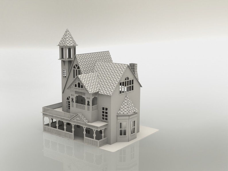 May include: A detailed, light gray miniature house with a tower, balcony, and multiple windows. The roof has a textured, shingle-like pattern. The house is a model, likely for display or crafting.