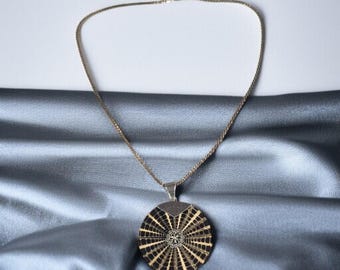 Stunning Nautilus Pendant with Sterling Silver Details and 18" Italy Sterling Silver Rope Chain with Platinum overlay.