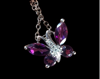 Dainty Butterfly Pendant, Sterling Silver, Lab Purple Topaz, and Cubic Zirconia on 18" 925 chain.