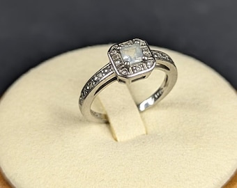 Sterling Silver Light Blue Topaz Gemstone Solitaire With Clear Stone Accents Ring Size 6.75