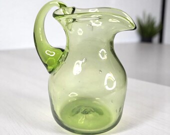 Dainty Hand-Blown Green Glass Pitcher – Heart-Shaped Spout – c. Early 20th Century – 5" Tall – Art Glass Decor