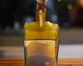 Clevenger Brothers Vintage E.G. Booz 1847 Old Cabin Whiskey Bottle – Amber Cabin-Shaped Glass Flask – 1960s Mid-Century Reproduction