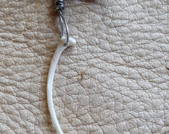 Real single snake rib bone on silver-plated brass ear cuff