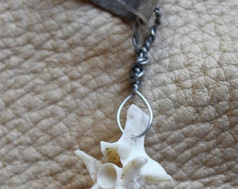 Real single snake vertebra bone on silver-plated brass ear cuff