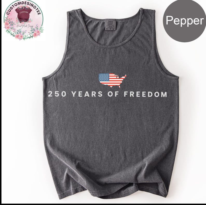 A gray tank top with the text "250 YEARS OF FREEDOM" printed on it, along with an American flag design.