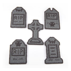 May include: Five gray felt tombstone and cross decorations with the word "RIP" on the tombstones.