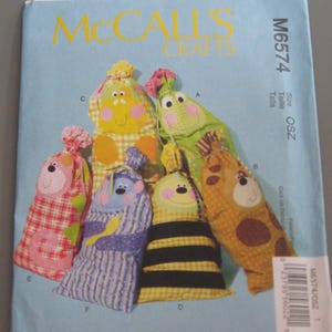 McCall&#39;s M6574 Sewing Pattern Gift Sacks Gift Bags Applique faces uncut factory folds