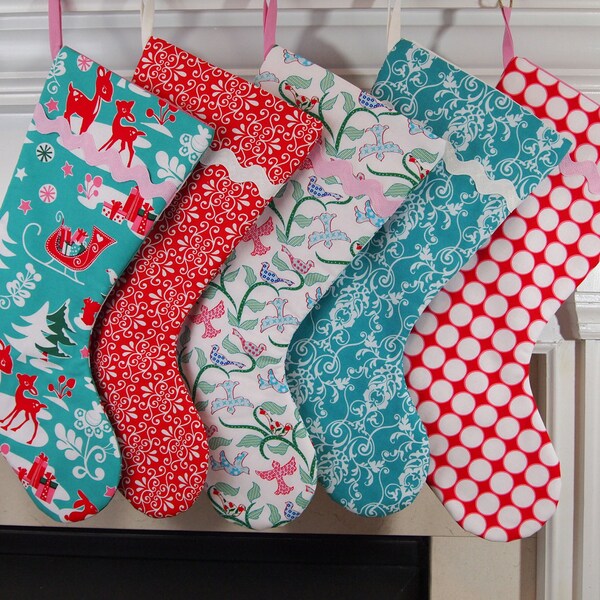 Set of Five Christmas Stockings in Red, Teal and Pink