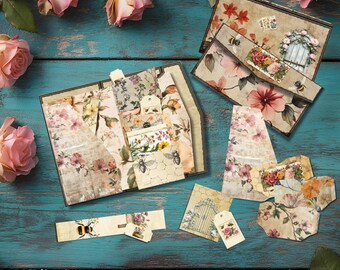 May include: A set of floral patterned paper crafting supplies with a bee and honeycomb design. The set includes envelopes, tags, and a foldable card with a gate design.