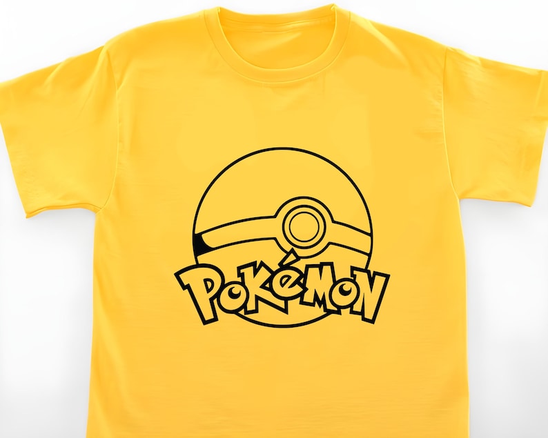 May include: Yellow t-shirt with a black outline of a Pokeball and the word "Pokemon" printed on the front.