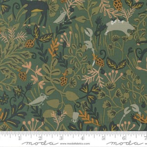 May include: Green fabric featuring a forest design with deer, birds, and other woodland creatures. The pattern includes leaves, berries, and flowers in shades of green, brown, and peach. A ruler is along the bottom of the fabric.