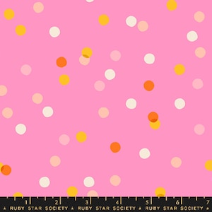 May include: Pink fabric with a confetti pattern featuring yellow, orange, and white circles.