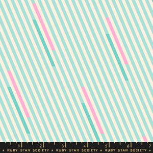 May include: Fabric with a repeating pattern of diagonal stripes in light blue, cream, and pink. The stripes are of varying widths, creating a dynamic visual effect. The text at the bottom reads "RUBY STAR SOCIETY".