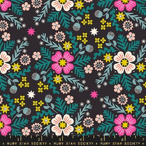 May include: A black fabric with a repeating pattern of pink, yellow, and white flowers, green leaves, and white stars.