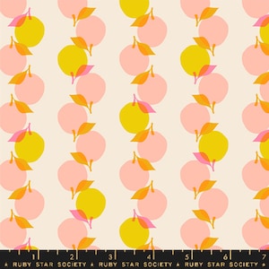 May include: Fabric with a repeating pattern of stylized fruit. The design features alternating rows of pink and yellow circles, each with orange and yellow leaves. The background is a light cream color. The text "RUBY STAR SOCIETY" is at the bottom.