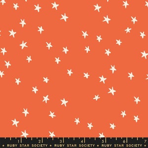 May include: A bright orange fabric with a white star pattern. The fabric is a repeating pattern of white stars on a solid orange background.