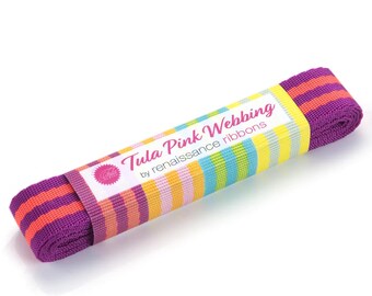 Puede incluir: Cinta de tejido de color morado y naranja con rayas con una etiqueta que dice "Tula Pink Webbing by renaissance ribbons".