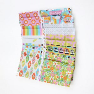 May include: A collection of colorful fabric swatches with various retro-inspired patterns. Designs include floral, geometric, and motel keychains. Some fabrics feature text like "Sunshine Inn" and "Spring 2022".