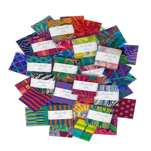 May include: A collection of colourful fabric squares with a variety of patterns, including stripes, polka dots, and floral designs. Each square has a label that reads "Free Spirit" and a number.