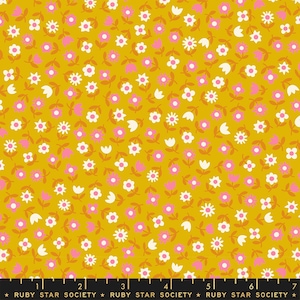 May include: A yellow fabric with a repeating pattern of pink and white flowers. The fabric is a cotton blend and is perfect for quilting, sewing, and crafting.
