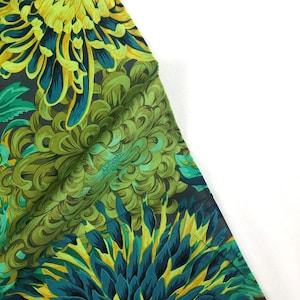 May include: Green and yellow floral fabric with a large, stylized chrysanthemum design.