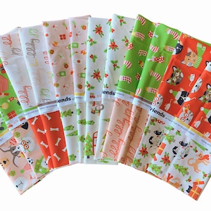 May include: A set of 12 festive fabric squares featuring a Christmas theme with dogs and cats wearing holiday attire. The fabrics are in various colors, including red, green, white, and pink. The fabrics are printed with a variety of holiday designs, including Christmas trees, ornaments, and presents. The fabrics are perfect for crafting projects, such as quilts, pillows, and bags.
