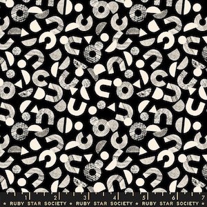 May include: Black and white fabric with a geometric pattern of circles, semi-circles, and U-shapes. The pattern is repeated throughout the fabric.