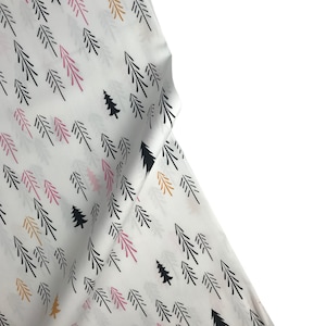 May include: White fabric with a repeating pattern of black, pink, and orange stylized pine trees.
