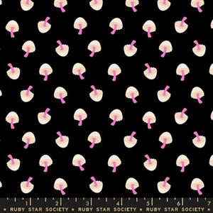 May include: Black fabric with a repeating pattern of white mushrooms with pink stems. The fabric has a ruler printed at the bottom with the text "RUBY STAR SOCIETY".