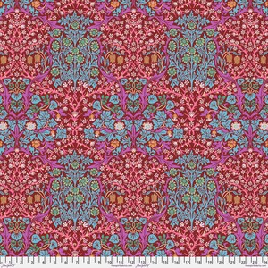 May include: A repeating pattern of floral designs in shades of pink, blue, green, and orange on a burgundy background. The pattern features stylized flowers, leaves, and vines.