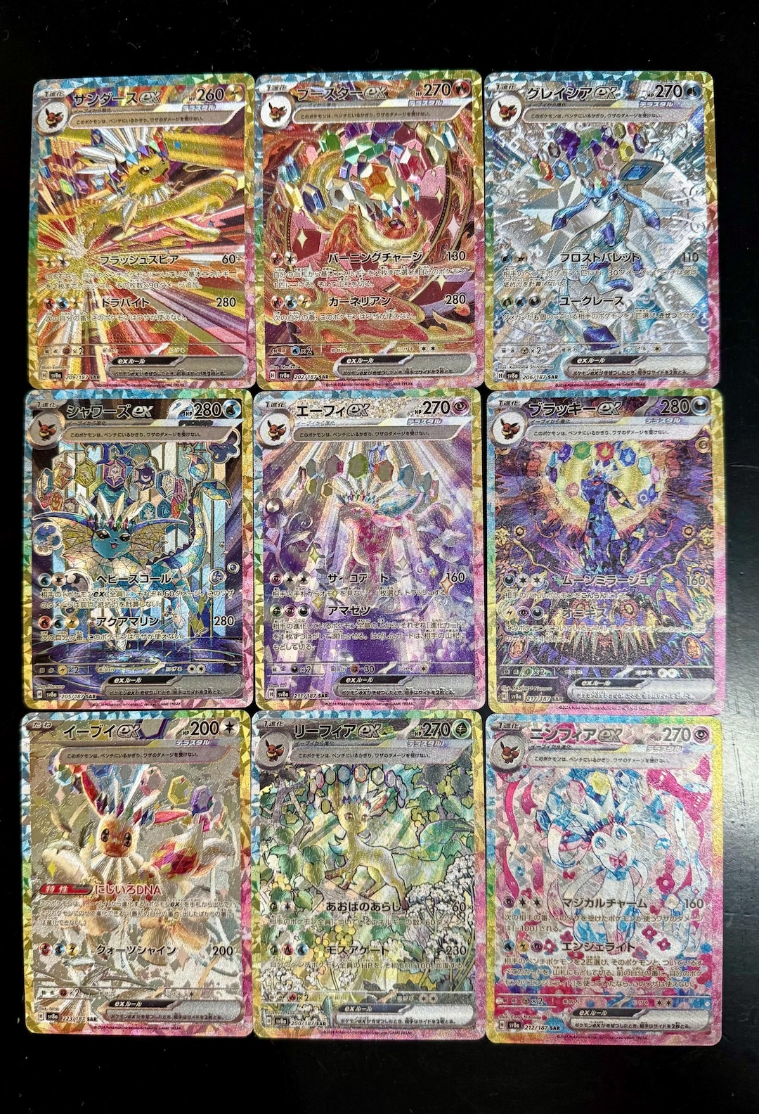 japanese pokemon cards prismatic evolutions How the English and Japanese Prismatic Evolutions Umbreon Compare