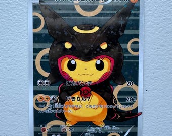 Poncho-Wearing Pikachu Rayquaza #231 XY-P PROXY Card (Holographic)