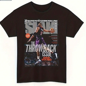 May include: Black cotton t-shirt featuring a magazine cover design. The design includes the word "SLAM" in large letters, a basketball player in action, and the text "THE THROWBACK ISSUE". The shirt also has a "100% Cotton" tag.