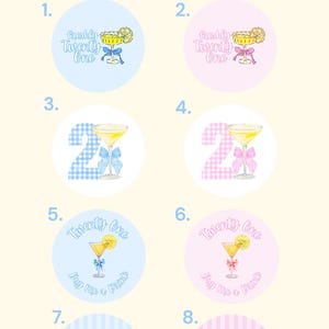 May include: A collection of eight circular pinback buttons labeled 1 through 8, featuring designs with cocktails, bows, and text including "Freshly Twenty One," "Twenty One Buy Me a Drink," and "Birthday Girl" in blue and pink color schemes.