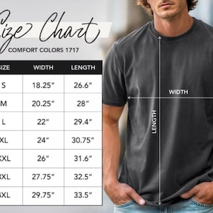 May include: A size chart for Comfort Colors 1717 t-shirts. The chart displays sizes S to 4XL, with corresponding measurements for width and length in inches. A person is wearing a dark gray t-shirt, with arrows indicating width and length.