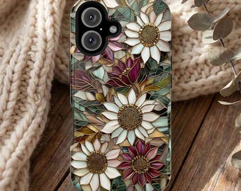 May include: A smartphone case featuring a stained glass style pattern of white and deep magenta flowers with textured gold centers, interspersed with green and brown foliage elements, surrounding a black dual camera lens module at the top.