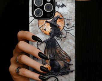 May include: A phone case featuring a marble-textured background with a raised, dark-toned illustration of a witch in a pointed hat standing before a large orange moon, accompanied by a black cat, a pumpkin, and small bats flying in the sky.