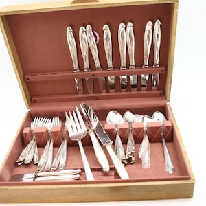 Silver Sculpture by Reed and Barton Sterling Silver Flatware Set for 8 plus more