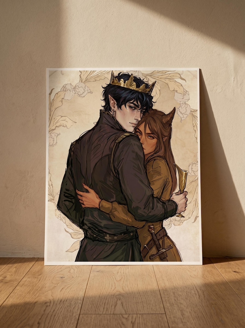 May include: An art print featuring a couple embracing. The male figure wears a gold crown and dark clothing. The female figure has horns and holds a golden goblet. The background has a floral design.