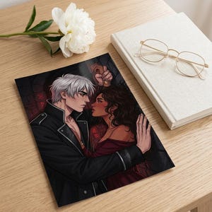 May include: An art print depicting a romantic illustration of a couple in an embrace. The man has white hair and wears a black jacket. The woman has dark hair and a red dress. A white flower, glasses, and a book are also visible.