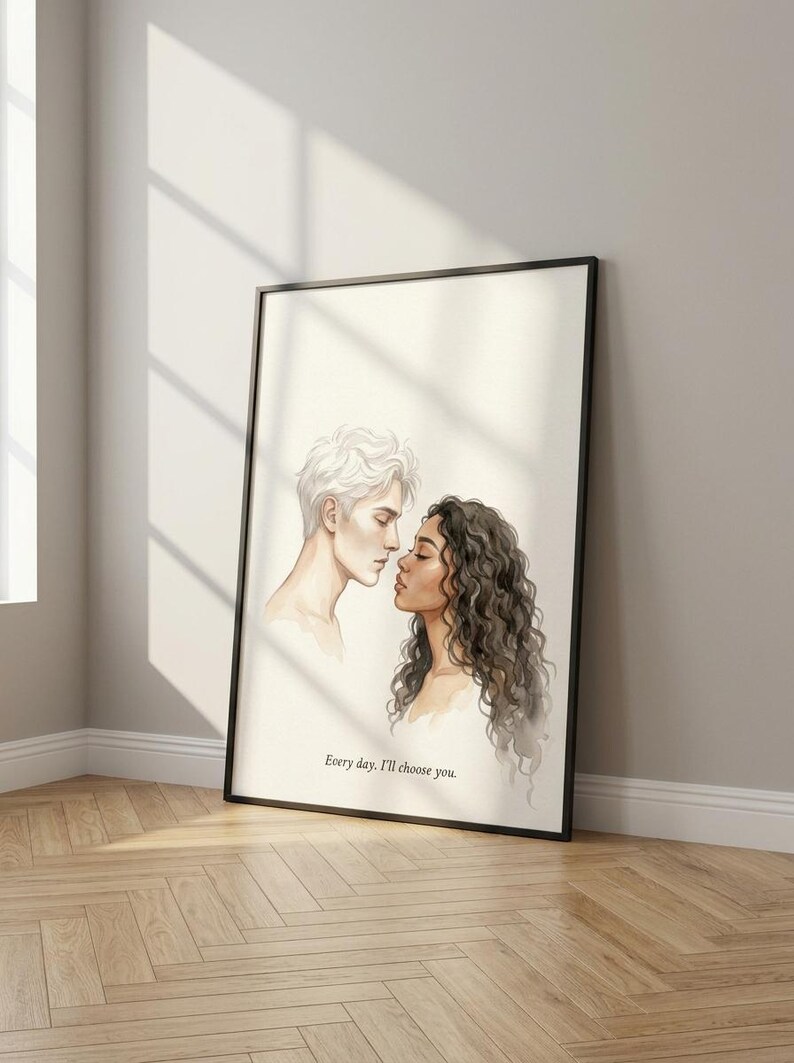 May include: A framed art print featuring a watercolor illustration of two people facing each other, nearly touching noses. One has white hair, the other has dark curly hair. The text "Every day, I'll choose you" is at the bottom.