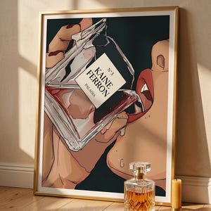 May include: Art print of a woman drinking from a perfume bottle. The bottle is labeled "KAINE FERRON" and "PALADIA". A second perfume bottle and a candle are on the wooden floor. The artwork is in a gold frame.