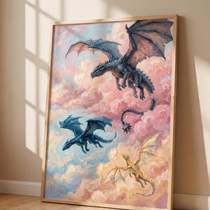 May include: A framed wall art print featuring an oil painting of three dragons flying through a sky filled with thick, textured pink and blue clouds. One large dark blue dragon, a smaller blue dragon, and a golden dragon are depicted in flight.