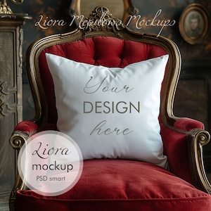 May include: A white pillow with the text "Your DESIGN here" on a red velvet armchair. The armchair has ornate gold trim and is in a vintage setting.