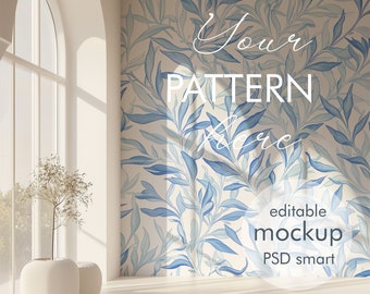 May include: A mockup of a wall with a blue and white floral pattern. The text "Your Pattern Here" is written on the wall. The text "editable mockup PSD smart" is written in a circle on the wall. The text "Liora Meadows Mockups" is written on the floor.