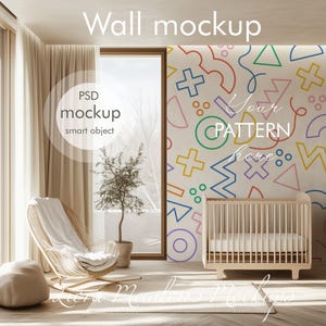 May include: A white crib with a wooden frame sits in a room with a large window and a white wall with a colorful geometric pattern. The text "Your Pattern Here" is written on the wall.