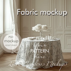 Puede incluir: Una mesa redonda cubierta con un mantel blanco con un delicado estampado de hojas negras. La mesa está puesta con platos, tazas y un jarrón de flores blancas. El texto incluye "Fabric mockup" y "Your pattern here".