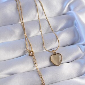 Gold-Plated Stainless Steel Necklace with Mother-of-Pearl Heart Pendant - Elegant & Refined