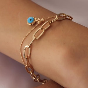 Bracelet à breloques perles superposées mauvais œil, bracelet Nazar doré, bracelet en acier inoxydable, -élégant et protecteur